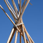 Detail,Of,Bare,Winter,Teepee,Poles,At,End,Of,Camping