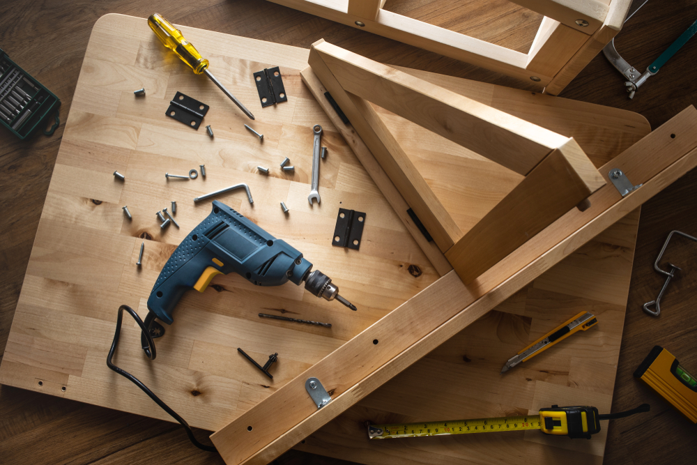 Top,View,Of,Drill,Tool,And,Another,Equipment,On,Wood