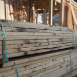 A,Pile,Of,Lumber,At,A,New,Home,Construction,Site.