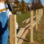 A,Woman,Diy,Enthusiast,Wearing,Overalls,And,Safety,Gloves,Is